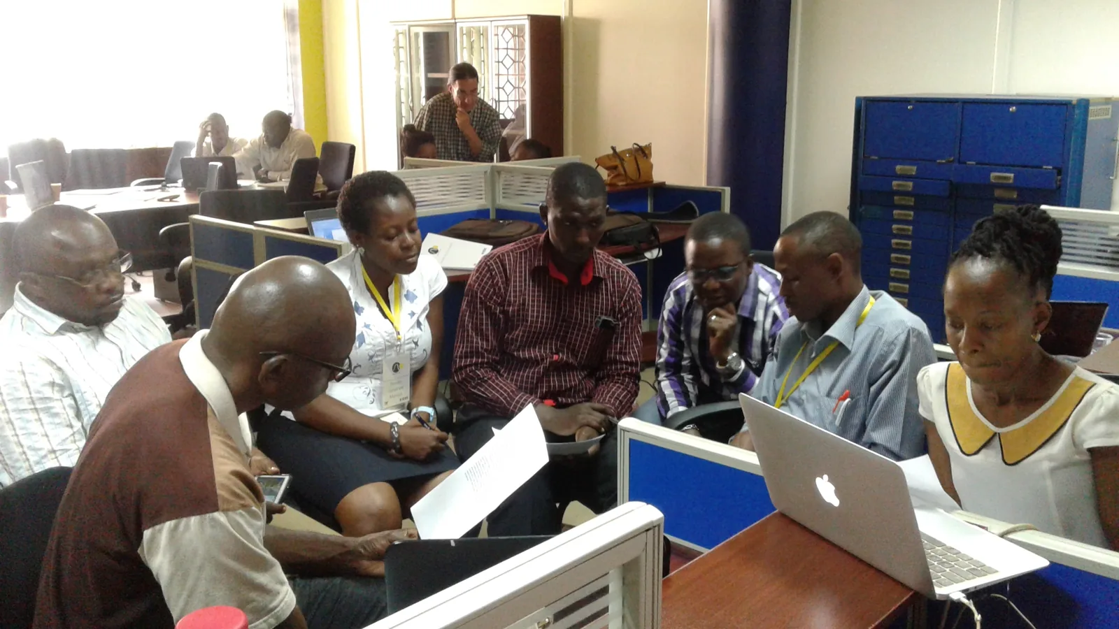 Members of the Software Systems Centre in a working session around laptops